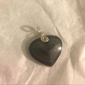 Black heart shaped stone pendant